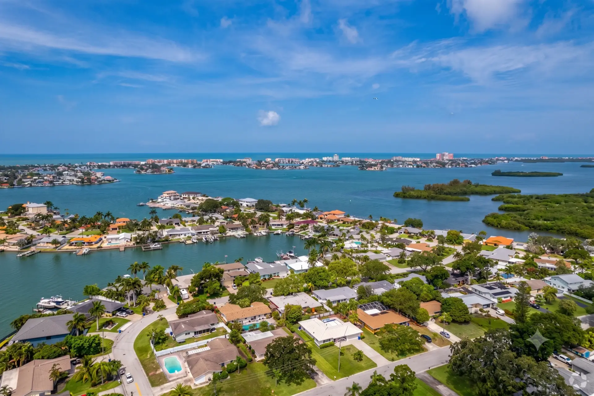 An aerial perspective of a waterfront neighborhood served by our local Tile Installation Seminole experts.