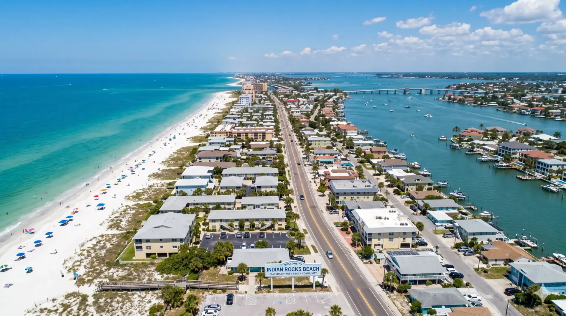 Aerial view of a sunny coastline highlighting homes that benefit from professional Tile Installation Indian rocks Beach.