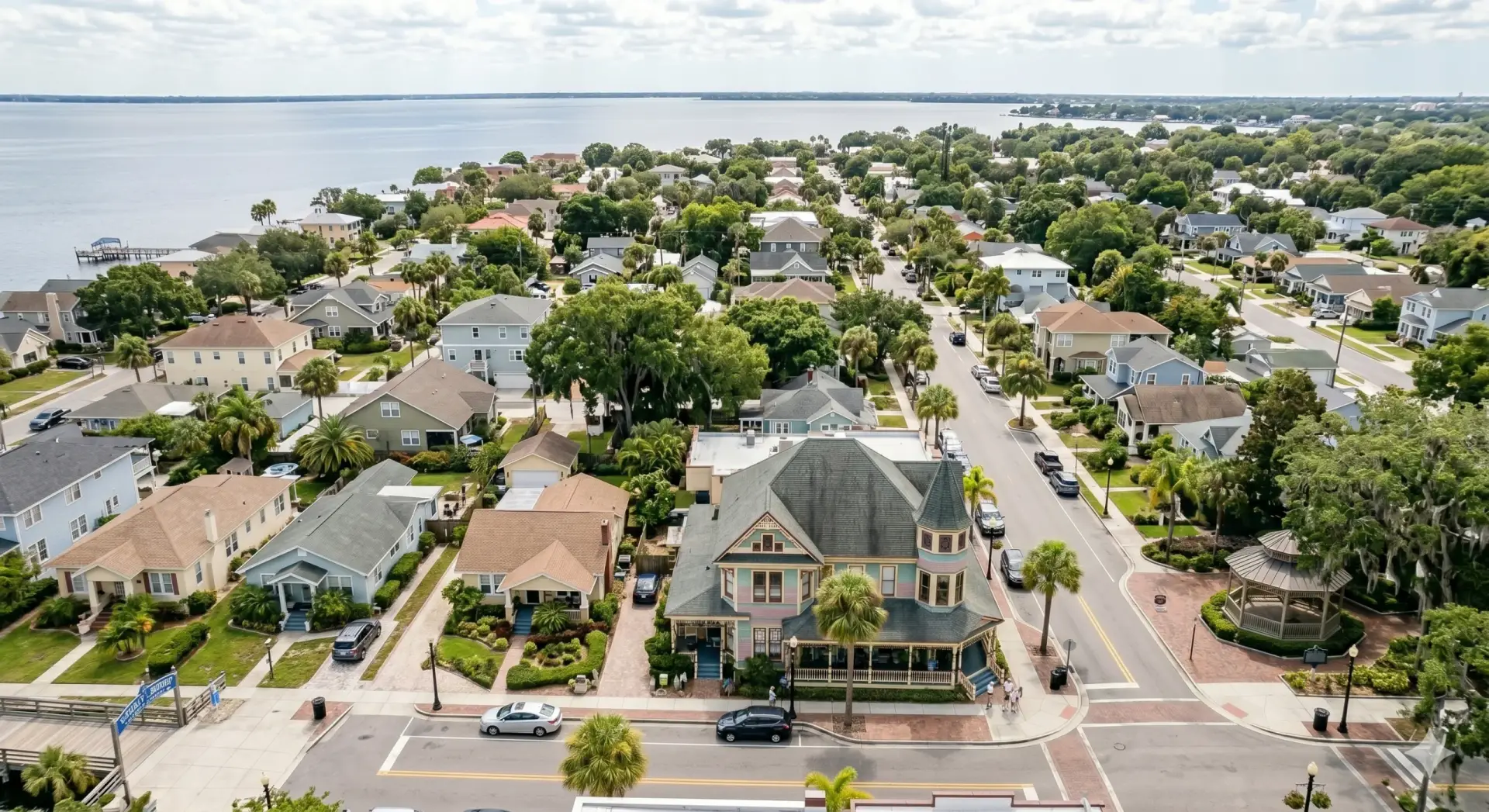 Aerial view of houses, trees, and bay in Safety Harbor; Tile Installation Safety Harbor serves this charming town.